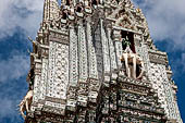 Bangkok Wat Arun - The top section of the Phra Prang is guarded at the four cardinal points by the Hindu god Indra on his three-headed elephant Erawan. 